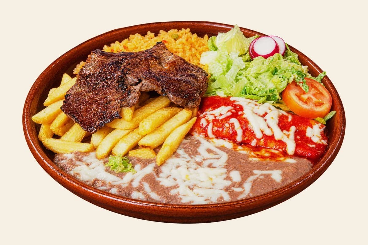Tampiqueña: grilled steak with a red enchilada, french fries, refried beans, lettuce and radish